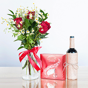 Red rose 50 cm - 7, Chamomile - 3, Aspidistra (1 pc.), Ruscus, Ribbon, Lindt Candy Box, Non-alcoholic champagne or wine