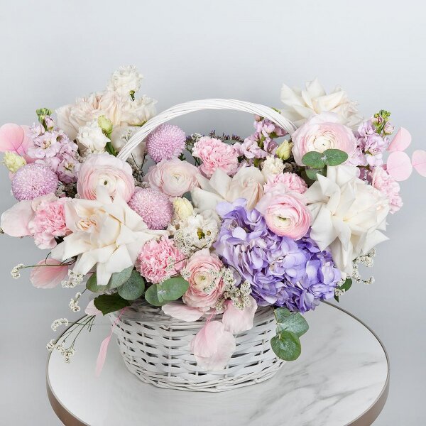 Momoko Chrysanthemum - 3, Blue/purple hydrangea - 1, Peony style roses - 9, Ranunculus Pink - 5, Matthiola Lilac - 3, lisianthus - 2, Pink carnation - 15, Medium Basket, Oasis, Limonium (1 pc.), Dried flowers in assortment, Eucalyptus