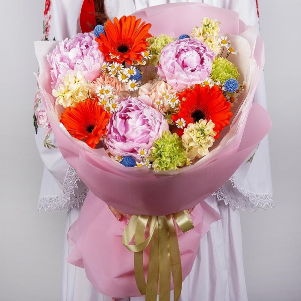 Gerbera daisies - 7, Peony pink - 3, Green carnation - 4, Baltica White Spray Chrysanthemum - 1, Chamomile - 2, White Matthiola - 3, Carnation white, cream - 3, Craspedia, Wrapping Paper