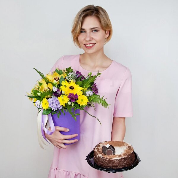Gerbera yellow - 3, Lilac carnation - 3, Orchid bud yellow/brown Cymbidium - 3, Alstromeria Yellow, Orange - 2, Purple Lisianthus (Eustoma) - 7, Bacardi Yellow Spray Chrysanthemum - 3, Alstromeria lilac, purple - 2, Round flower box small , Film, Oasis, Pistachio, Ruscus, Ambrella, Flask for orchids, Ribbon, Cake in assortment