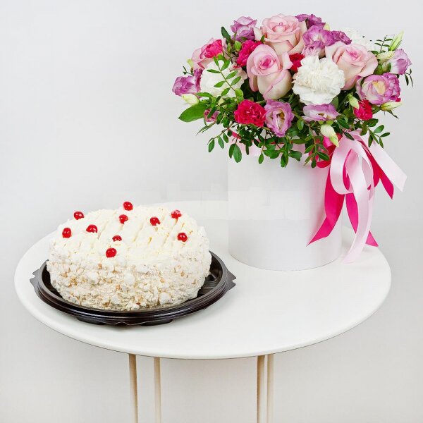 Carnation white, cream - 6, Pink Lisianthus (Eustoma) - 7, Pink spray carnation - 5, Pink rose 50 cm - 5, Round flower box small , Oasis, Film, Pistachio, Ribbon, Cake in assortment