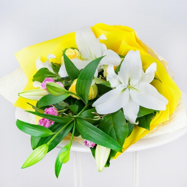 Lilies - 3, Yellow rose 50 cm - 5, Bright pink spray rose mix, 50 cm - 3, Salal, Wrapping Paper