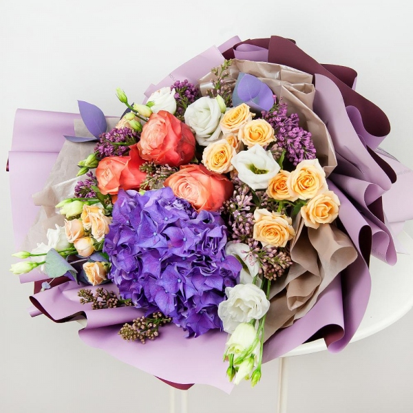 Blue/purple hydrangea - 1, Peony rose Kahala 50 cm - 5, Spray rose: white, cream, light pink 50 cm - 5, Lilac Bush - 4, lisianthus - 4, Eucalyptus Cinerea, Wrapping Paper