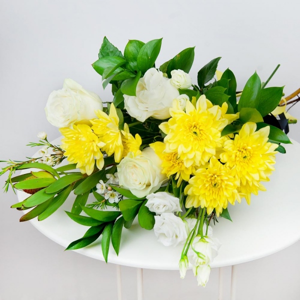 Baltica Yellow Spray Chrysanthemum - 4, White rose 50 cm - 5, lisianthus - 3, Leukodendron, Waxflower (1 pc.), Ruscus, Ribbon