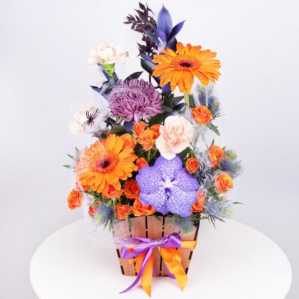 Gerbera daisies - 2, Chrysanthemum Bigoudi purple - 1, Spray rose: yellow, orange 50 cm - 2, Vanda Orchid bud - 1, Carnation white, cream - 3, Wooden pot, Oasis, Ruscus, Pistachio, Flask for orchids, Eryngium, Dried flowers decor, Decorative element small, Ribbon