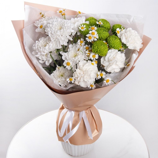 Baltica White Spray Chrysanthemum - 2, Carnation white, cream - 4, Chamomile - 1, Athos pom Feeling Green - 1, Wrapping Paper