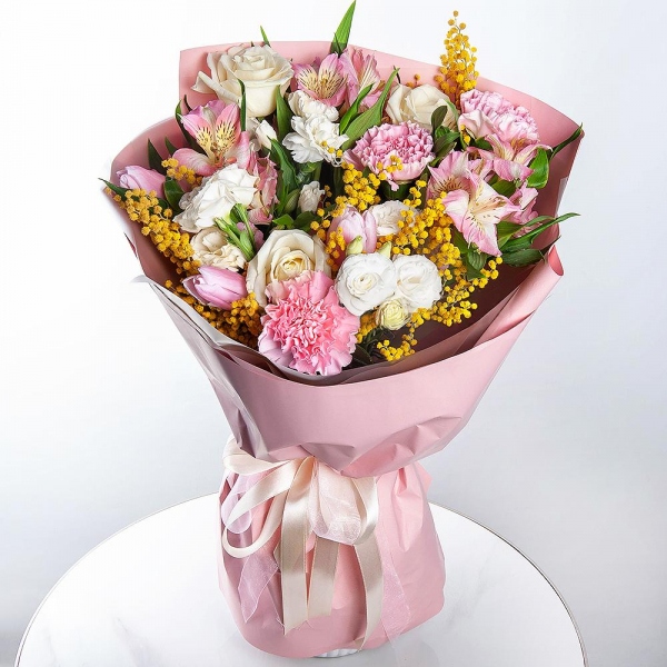 White rose 50 cm - 3, Alstromeria white, soft pink - 3, White spray carnation - 1, lisianthus - 1, Pink tulip - 11, Mimosa - 1, Pink carnation - 7, Wrapping Paper