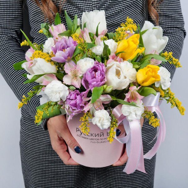 Tulip white - 4, Alstromeria white, soft pink - 3, White spray carnation - 2, Yellow tulip - 2, Lilac tulip - 3, Round flower box small , Oasis, Pistachio, Solidago (1 pc.), Ribbon